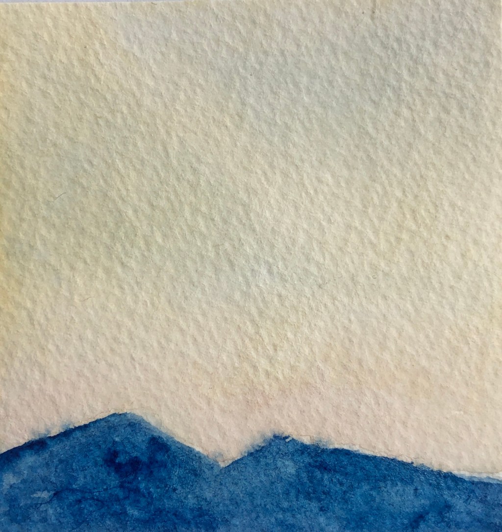 2 inch by 2 inch mini watercolor painting depicting the sun rising behind blue mountains in the distance.
